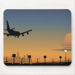 Silhouette of an aeroplane in flight mouse mat