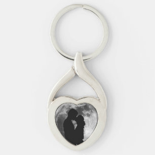Silhouette of lovers in a full moon at night key ring