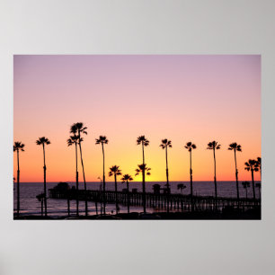 Silhouette of palm trees and dock during sunset poster