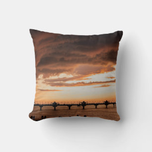 SILHOUETTE OF PEOPLE ON BEACH DURING SUNSET CUSHION