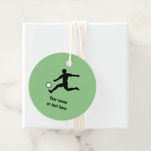 Silhouette of Soccer Player with Ball on green
