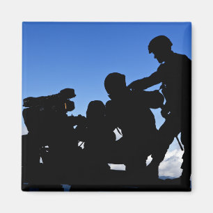 Silhouette of soldiers magnet