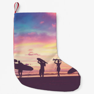 Silhouette Of surfer people carrying their surfboa Small Christmas Stocking