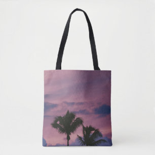 Silhouette of tree during sunset tote bag