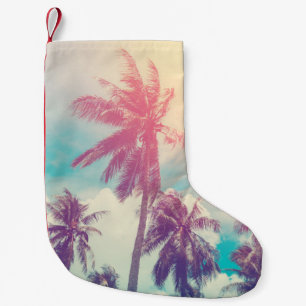 Silhouette palm trees, sunset abstract. small christmas stocking