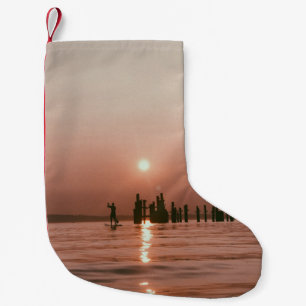 SILHOUETTE PHOTO OF PERSON HOLDING BOAT PADDLE SUR SMALL CHRISTMAS STOCKING