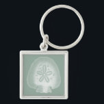 Silhouette Sand Dollar Key Ring<br><div class="desc">Can you imagine living your life on the beach? Get this beautiful image of this silhouette sand dollar to add to your beach collection. This unique translucent piece of art work is great on any of your Zazzle products. It's contemporary and modern art will make you the most stylish among...</div>