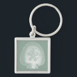 Silhouette Sand Dollar Key Ring<br><div class="desc">Can you imagine living your life on the beach? Get this beautiful image of this silhouette sand dollar to add to your beach collection. This unique translucent piece of art work is great on any of your Zazzle products. It's contemporary and modern art will make you the most stylish among...</div>