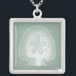 Silhouette Sand Dollar Silver Plated Necklace<br><div class="desc">Can you imagine living your life on the beach? Get this beautiful image of this silhouette sand dollar to add to your beach collection. This unique translucent piece of art work is great on any of your Zazzle products. It's contemporary and modern art will make you the most stylish among...</div>