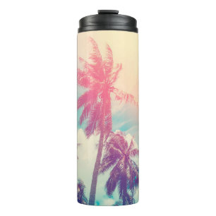 Silhouette tropical palm tree with sun light on su thermal tumbler