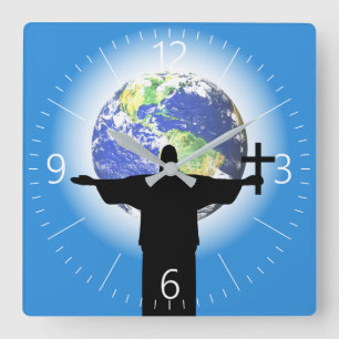 Silhouette with a cross square wall clock