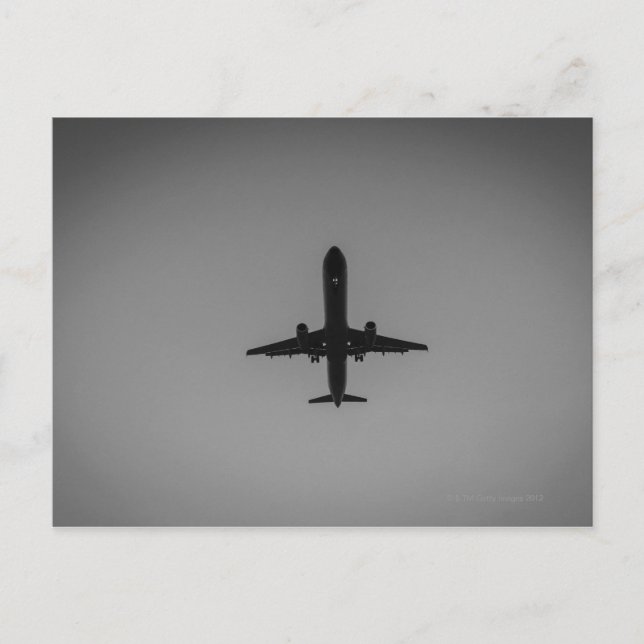 Silhouetted aircraft landing postcard (Front)