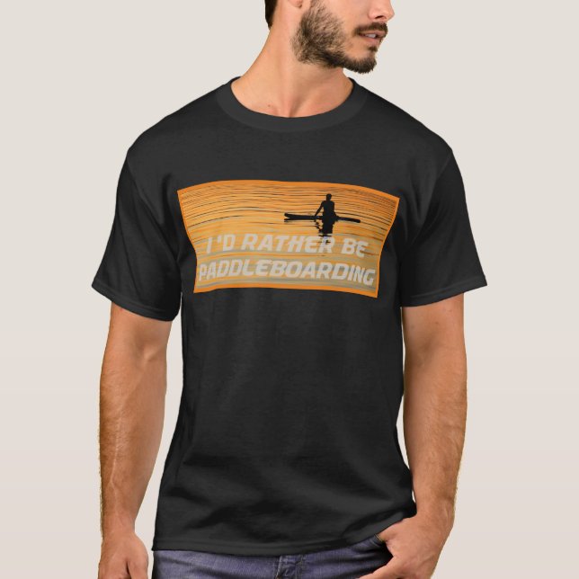 Silhouetted paddle boarder peaceful sunset T-Shirt (Front)