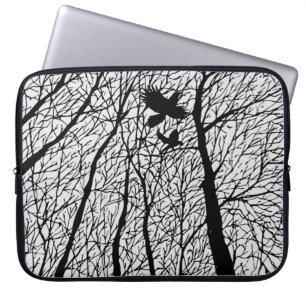 Silhouetted Ravens in the Winter Trees Laptop Sleeve