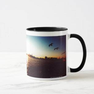 Silhouetted Tokyo Bay skyline at sunset Mug