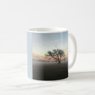 Silhouetted Tree in Misty Field Coffee Mug