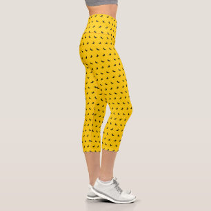 Silhouettes of Small Black Bananas on Yellow Capri Leggings