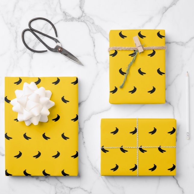 Silhouettes of Small Black Bananas on Yellow Wrapping Paper Sheet (Front)