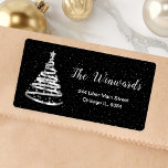 Silver and Black Ribbon Christmas Tree Label<br><div class="desc">This elegant and chic address label features a silver ribbon Christmas tree with a star topper. The text combines handwritten script and modern sans serif fonts for a classy and sophisticated look. The falling snow, snowflakes and sparkles give a festive and magical touch. This is perfect for Christmas and the...</div>