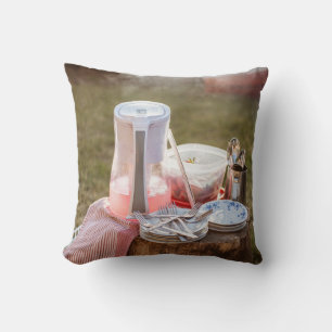 Silver-and-blue floral ceramic plates and pitcher cushion