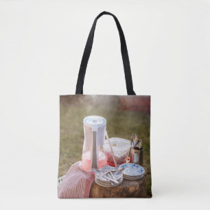 Silver-and-blue floral ceramic plates and pitcher tote bag