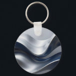 Silver And Navy Fluid Waves Abstract Modern Design Key Ring<br><div class="desc">Immerse yourself in pure liquid elegance with this stunning abstract composition of flowing,  molten metallic waves. Smooth chrome-silver ribbons intertwine with deep midnight navy creating a luxurious,  almost hypnotic sense of movement and depth. Perfect for those who love sophisticated,  contemporary minimalism with a high-end,  futuristic touch.</div>
