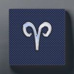 Silver Aries Zodiac Sign Blue Carbon Fibre Print Plaque<br><div class="desc">A silver chrome like Aries zodiac symbol on a navy blue carbon fibre design texture print background. A modern urban racy design for a great custom birthday gift idea. Embroidery designs are available in a selection of popular colour options. Use the "Ask this Designer" link to contact us with your...</div>