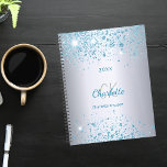 Silver blue glitter name monogram 2025 planner<br><div class="desc">A faux silver metallic looking background decorated with blue faux glitter dust. Personalise and add your first name,  monogram initials,  full name and a year.</div>