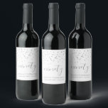Silver Confetti Personalised 90th Birthday Wine Label<br><div class="desc">Help her celebrate her 90th birthday in style with this simple but elegant design, featuring faux silver triangular confetti sifting down on the word "ninety" in stylish silver grey handwriting font. Personalise it with the name of the honoree in silver grey sans serif font, along with the occasion and date...</div>