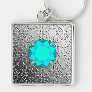Silver Damask with a faux aquamarine gemstone Key Ring