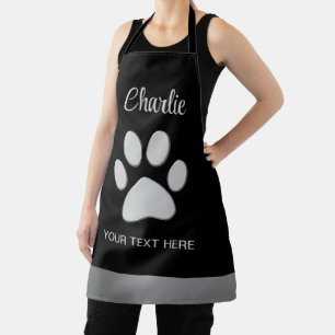 Silver Dog Paw on black background Apron