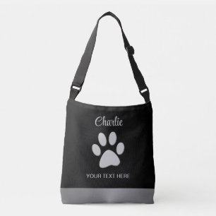 Silver Dog Paw on black background Crossbody Bag