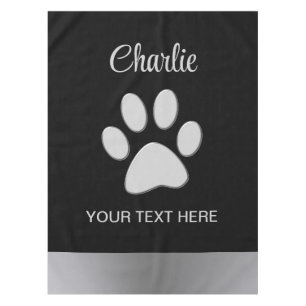 Silver Dog Paw on black background Tablecloth