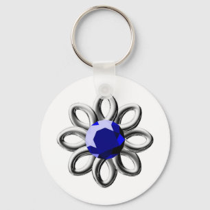 Silver flower with blue stone key ring