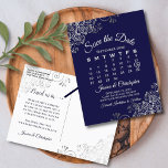 Silver Frills Navy Wedding Save the Date Calendar Announcement Postcard<br><div class="desc">This beautiful save the date postcard will give your friends and family advance notice of your upcoming wedding. It features a clever design with a custom calendar where you can put a heart around your wedding date. The background is navy blue, with light gray text and decorative silver gray faux...</div>