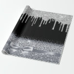 Silver glitter drips black sparkle wrapping paper<br><div class="desc">Elegant,  classic,  glamourous and feminine style party wrapping paper. A black background decorated with faux silver glitter drips and sparkle,  a silver bow and ribbon.  
Perfect for birthdays and Christmas gifts.</div>