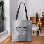 Silver Glitter Sparkle Eyelashes Monogram Name Tote Bag<br><div class="desc">Silver Faux Foil Metallic Sparkle Glitter Brushed Metal Monogram Name and Initial Eyelashes (Lashes),  Eyelash Extensions and Eyes Blush Pink Makeup Bag. The pillow makes the perfect sweet 16 birthday,  wedding,  bridal shower,  anniversary,  baby shower or bachelorette party gift for someone decorating her room in trendy cool style.</div>