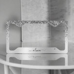 Silver Glitter Sparkle Glam Metal Monogram Name Licence Plate Frame<br><div class="desc">Silver Faux Foil Metallic Sparkle Glitter Brushed Metal Monogram Name License Plate Frame. This makes the perfect sweet 16 birthday,  wedding,  bridal shower,  anniversary,  baby shower or bachelorette party gift for someone that loves glam luxury and chic styles.</div>