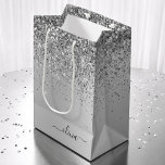 Silver Glitter Sparkle Metal Monogram Name Medium Gift Bag<br><div class="desc">Silver Faux Foil Metallic Sparkle Glitter Brushed Metal Monogram Name Gift Bag. This makes the perfect sweet 16 birthday,  wedding,  bridal shower,  anniversary,  baby shower or bachelorette party gift bag for someone that loves glam luxury and chic styles.</div>