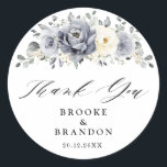 Silver Grey Ivory Floral Winter Wedding Thank you Classic Round Sticker<br><div class="desc">Elegant floral winter wedding thank you sticker features elegant grey ,  ivory and silver watercolor flower bouquet frosty-hued greenery. Please contact me for any help in customisation or if you need any other product with this design.</div>