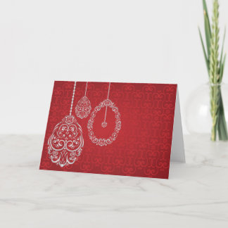 Silver hanging Easter eggs against a rich red back Holiday Card