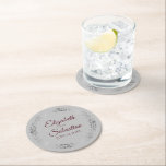Silver Lace Burgundy on Grey Elegant Wedding Round Paper Coaster<br><div class="desc">These beautiful wedding coasters feature a simple yet elegant design with burgundy script lettering and a silver faux foil lace border on a grey background. There is space for the couple's names and the wedding date. Wonderful wedding memento or save the date gift.</div>