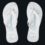 Silver Lace Teal Elegant White Bridesmaid Wedding Flip Flops<br><div class="desc">These elegant wedding flip flops are a great way to thank and recognise your bridesmaids, while giving their feet a rest after a long day. The beautiful design features an elegant design with silver grey lace frills on a white background and fancy teal or turquoise coloured script lettering. The text...</div>