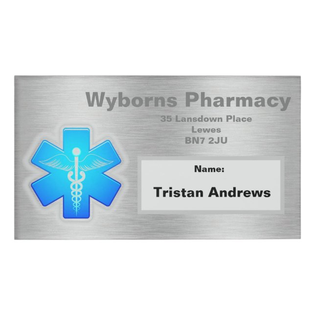 Silver name tag with pharmacy name (Front)