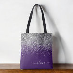 Silver Purple Glitter Girly Monogram Name Tote Bag<br><div class="desc">Purple and Silver Faux Sparkle and Glitter Elegant Monogram Book Bag. This Book Bag can be customised to include your initial and first name and given as a gift for Christmas,  Sweet 16 Birthday,  Bridal Shower or a Wedding.</div>