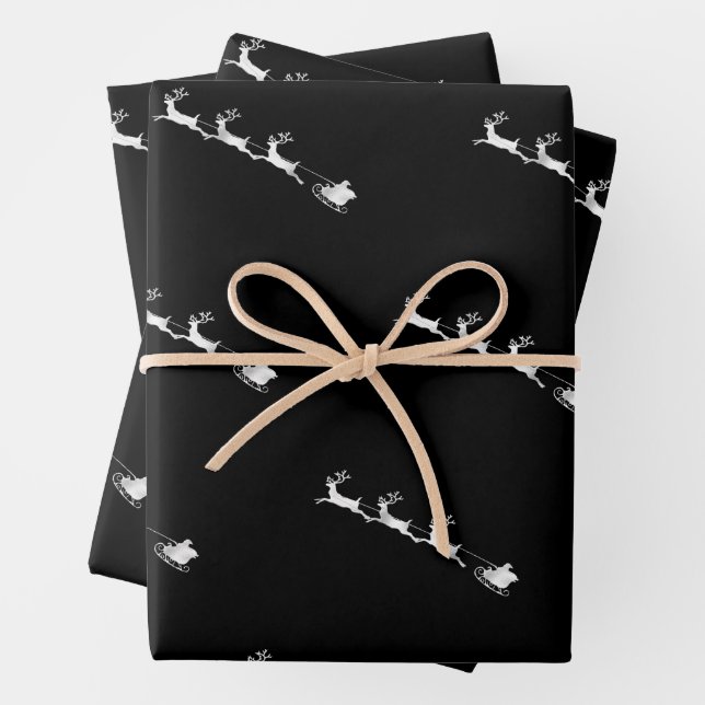 silver reindeer christmas pattern black background wrapping paper sheet (In situ)