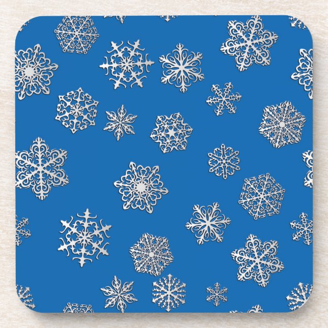 Silver snowflakes on a cobalt blue background coaster (Front)