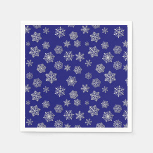 Silver snowflakes on a dark blue background napkin