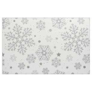 Silver snowflakes on white fabric