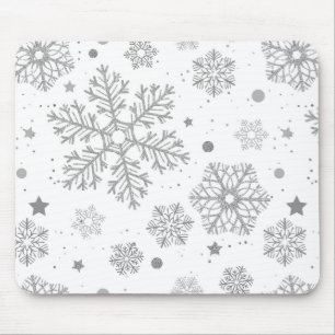 Silver snowflakes on white mouse mat